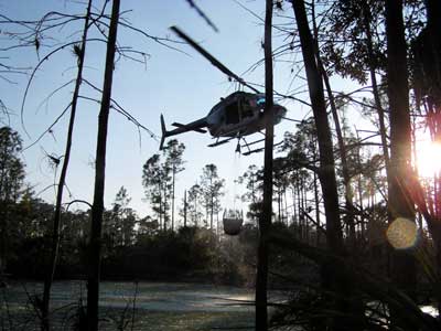 NPS Helicopter dipping water for fire fighting